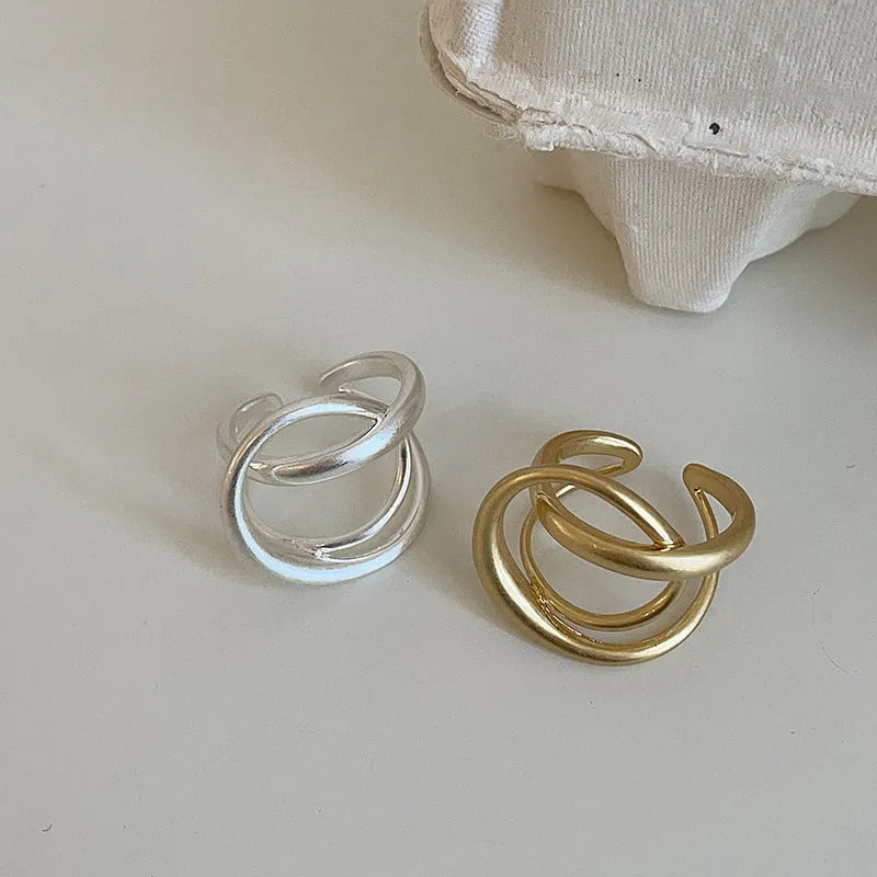 Women's geometric open ring with three-dimensional interlaced matte metal design