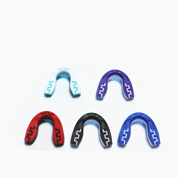 Adult boxing mouthguard with tooth socket design in black and white printed teeth for martial arts training
