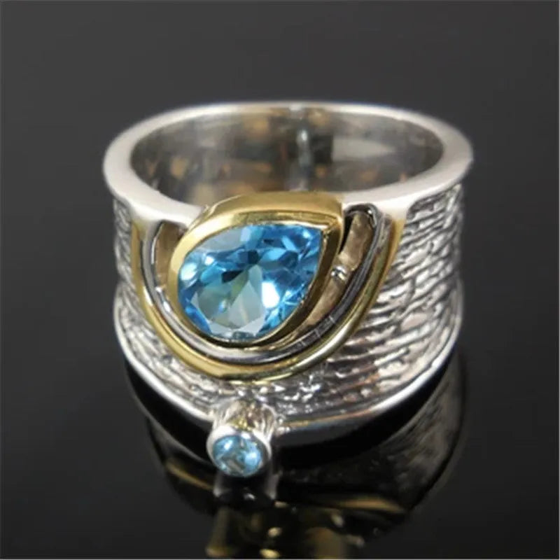 Chinese style women's blue rhinestone zircon ring with drop shape design on alloy band