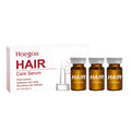 Three small 5ml bottles of hair root liquid treatment with botanical oils for scalp care.