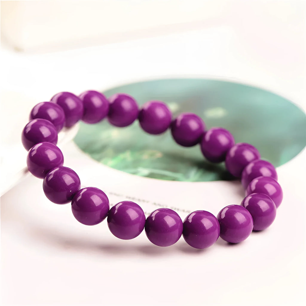 Jiuya polished crystal purple mica bracelet showing beads in an original design on a wrist.