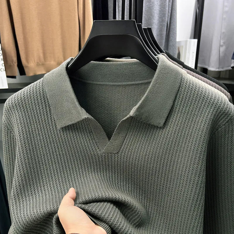 Men's loose fit casual pullover sweater in green, shown on a model.