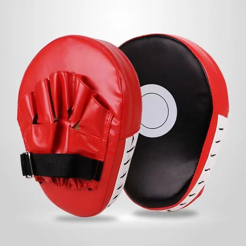 Boxing punching mitts in curved and flat designs for Muay Thai and Sanda training.