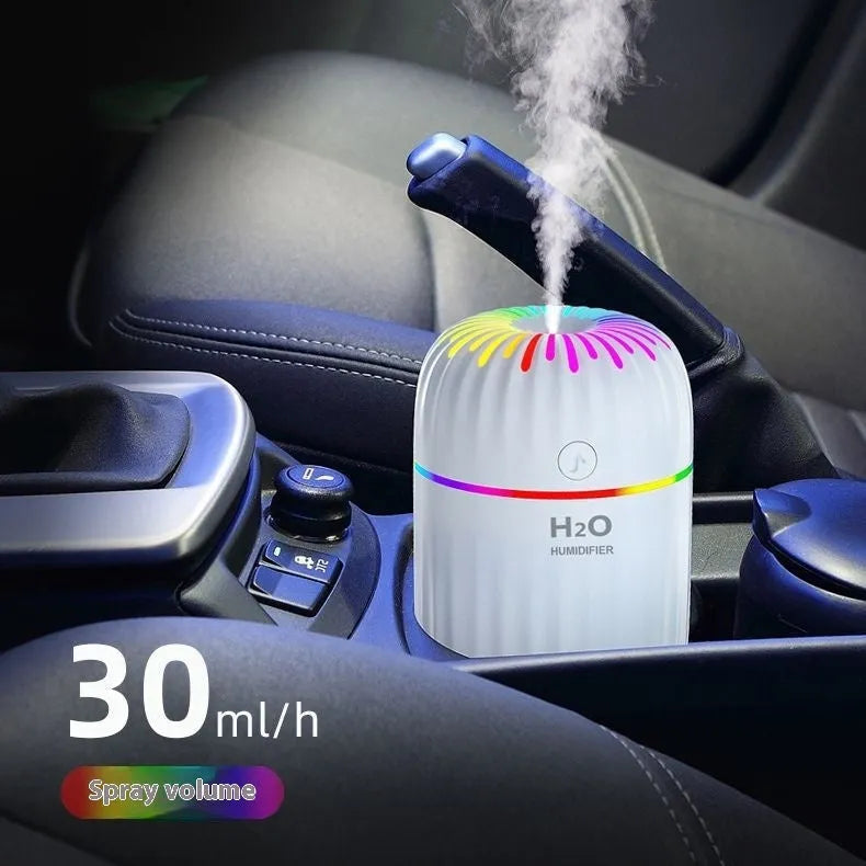 Mini animal-shaped USB humidifier and aromatherapy diffuser in green, pink, or white