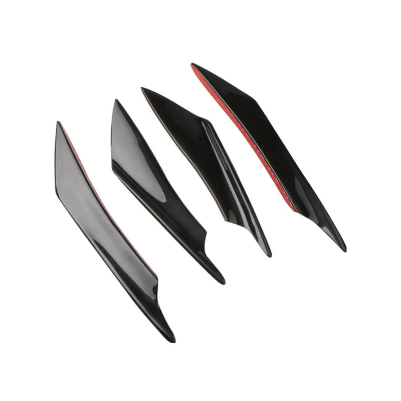 Set of four black carbon fibre pattern ABS plastic air knives for car bumper spoiler installation.