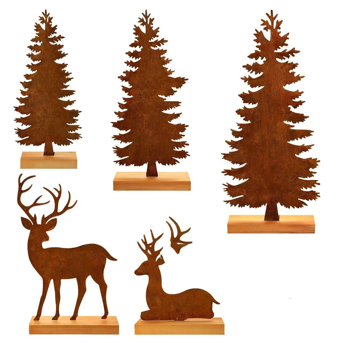 Three rusty metal Christmas decorations featuring elk and trees on a wooden surface
