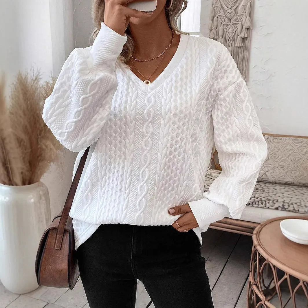 Milky white loose fit long sleeve T-shirt with a 3D pattern detail on the front
