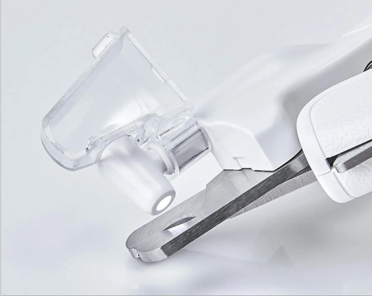 White LED pet nail clippers with transparent anti-splash guard open to show triangular stainless steel blades