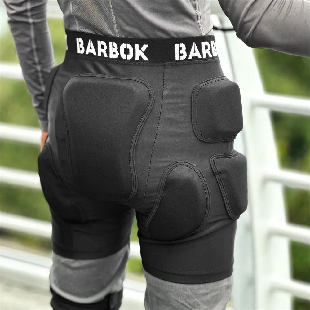 Black BA103 protective hip pad with elastic leg straps for roller skating and skateboarding safety.