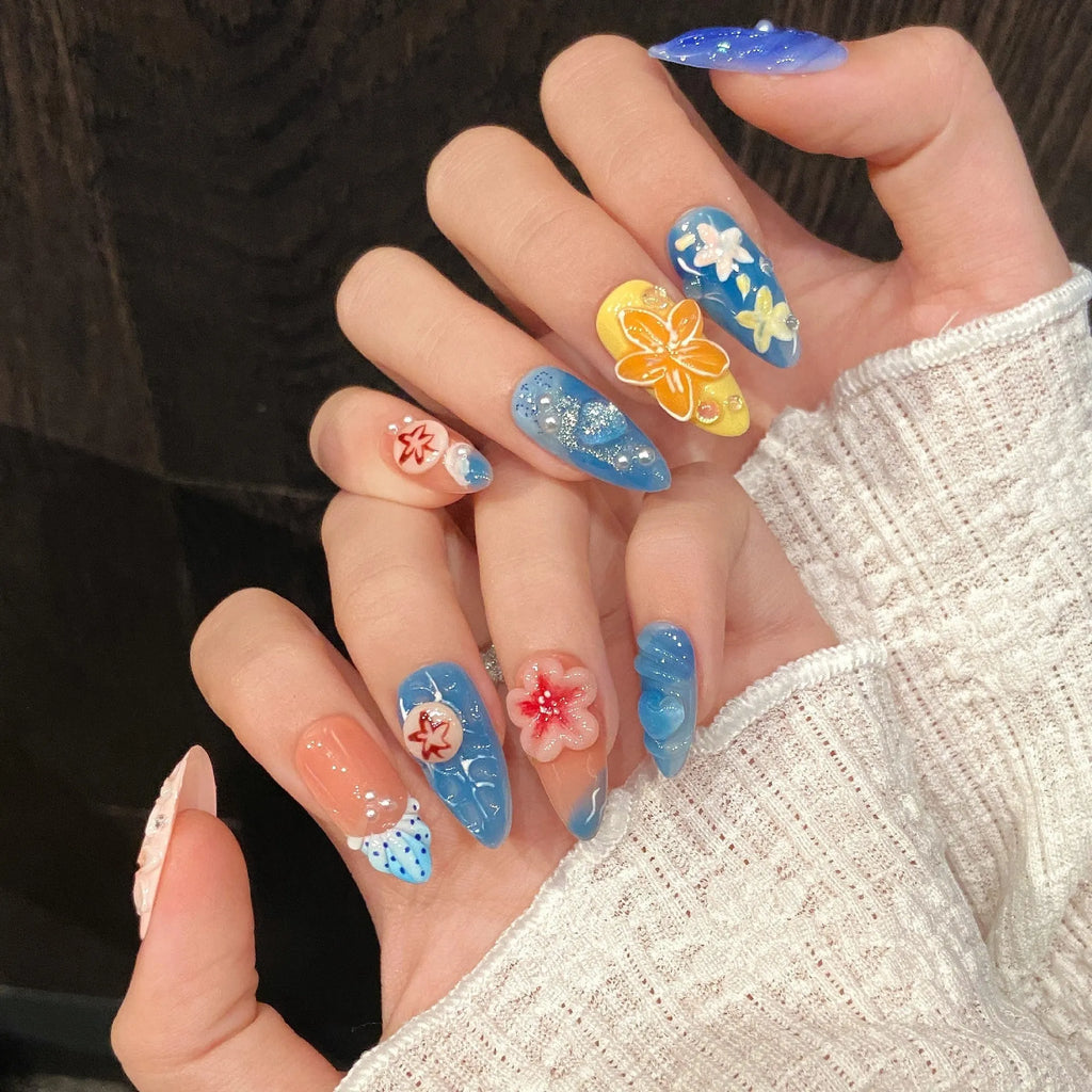 Three-dimensional carved jellyfish design on plastic wearable armour in almond nail colour.