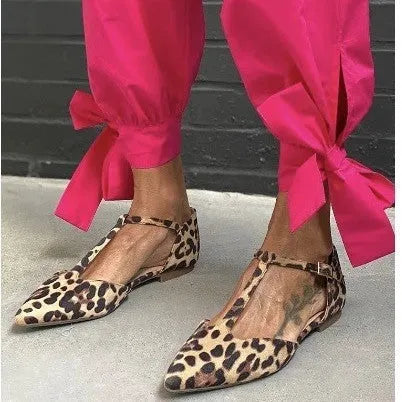 Women's leopard print pointed toe pumps with cross shoulder straps and chunky low heel