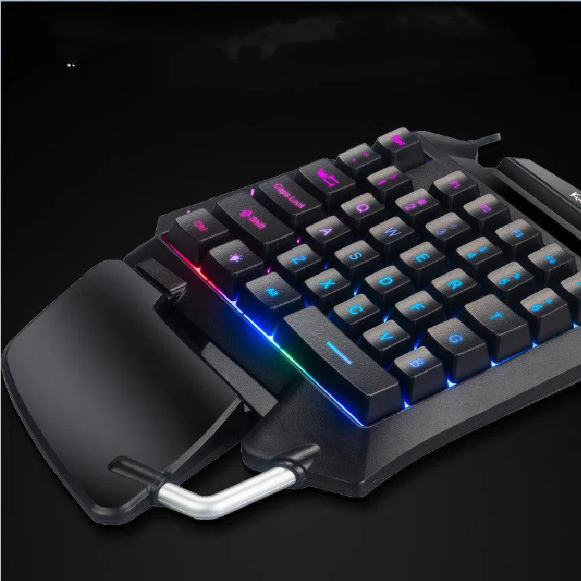 Black left-handed one-handed Throne converter gaming keyboard with hand rest for desktop.