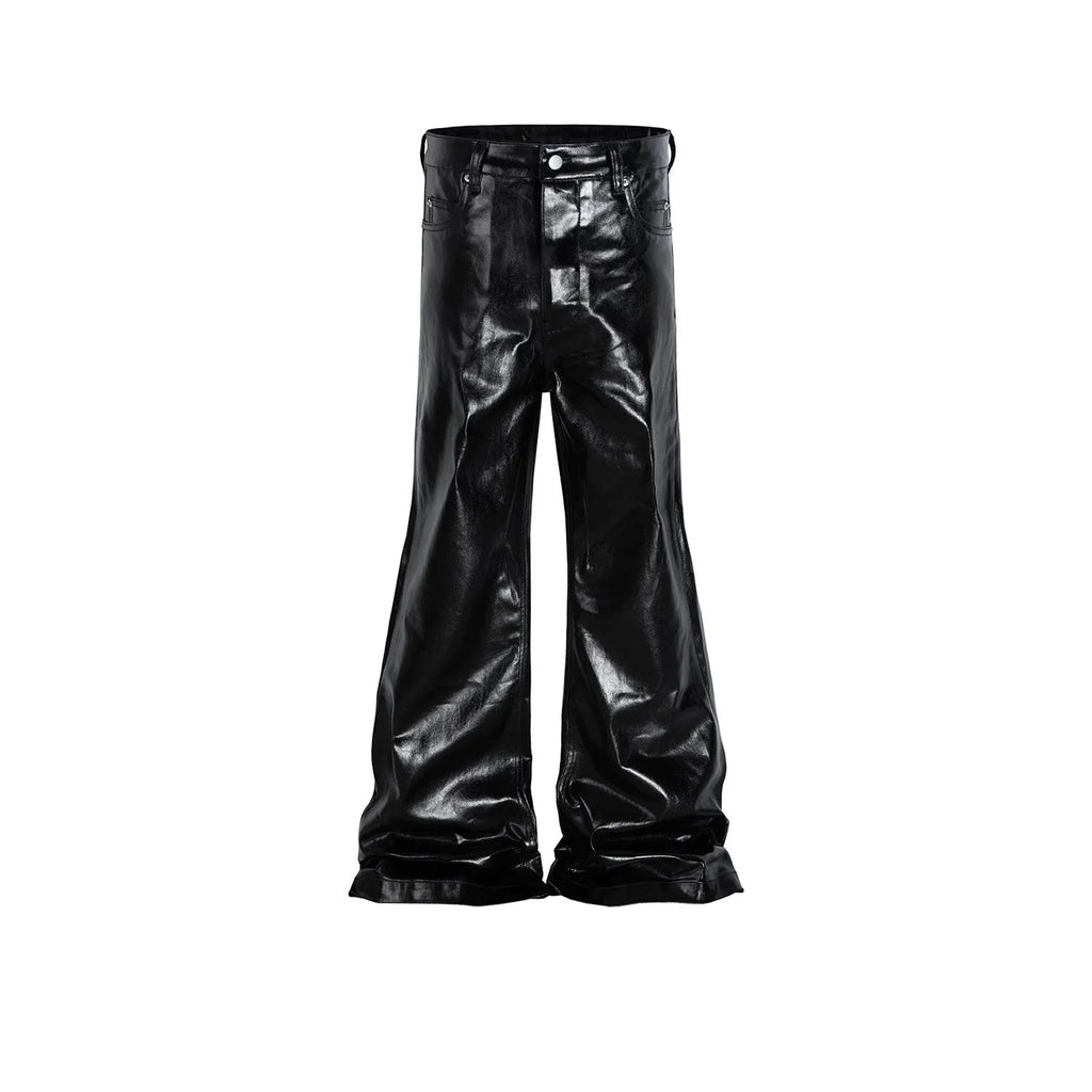 Black shiny patent leather skinny jeans with mid waist and straight leg on a model
