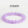 Lavender amethyst crystal bracelet with round beads showing water ripple pattern in light purple colour