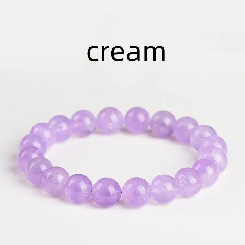 Lavender amethyst crystal bracelet with round beads showing water ripple pattern in light purple colour