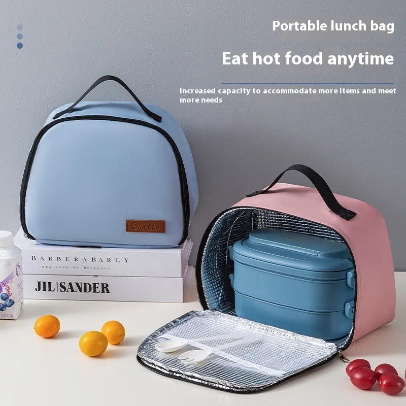 Large insulated lunch bag in textured cloth, shown in purple colour with bento box inside