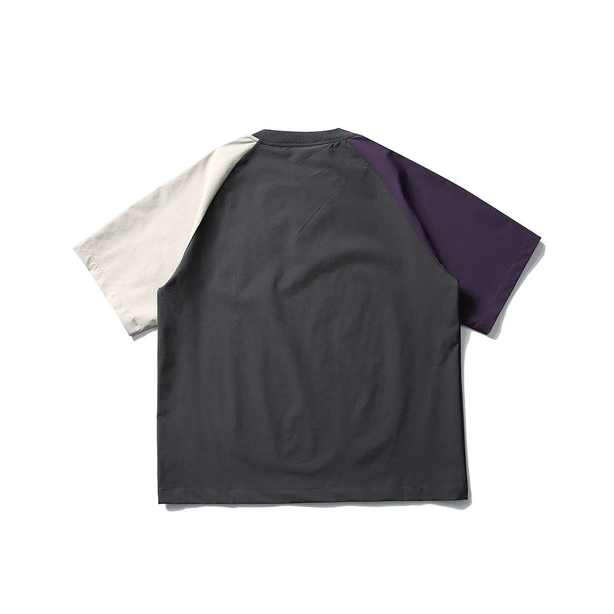 Dark grey loose-fit T-shirt with contrast colour raglan sleeves showing quick-drying polyester construction