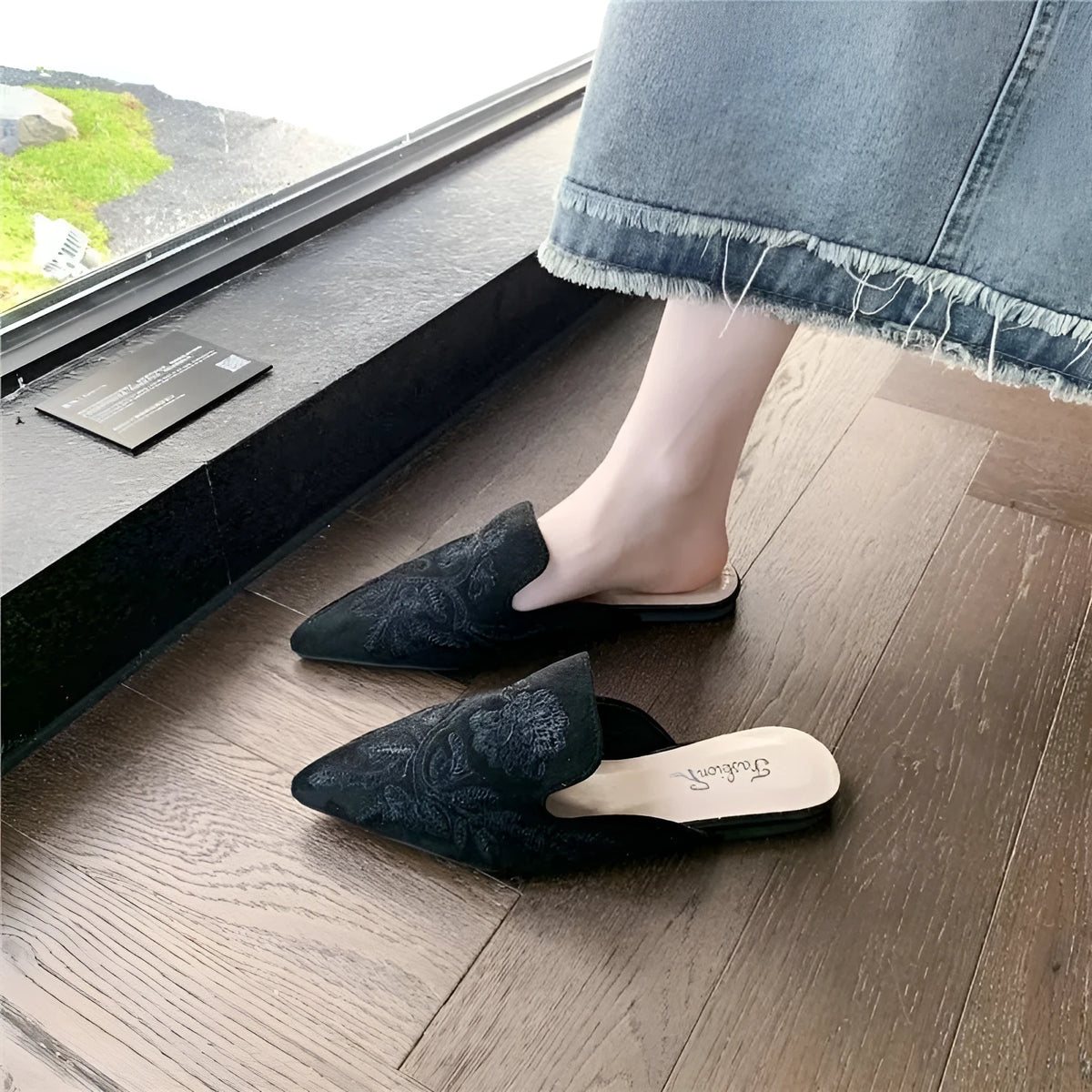 Women's embroidered round toe slippers with PU upper and rubber sole, shown in black colourway, sizes 35 to 40