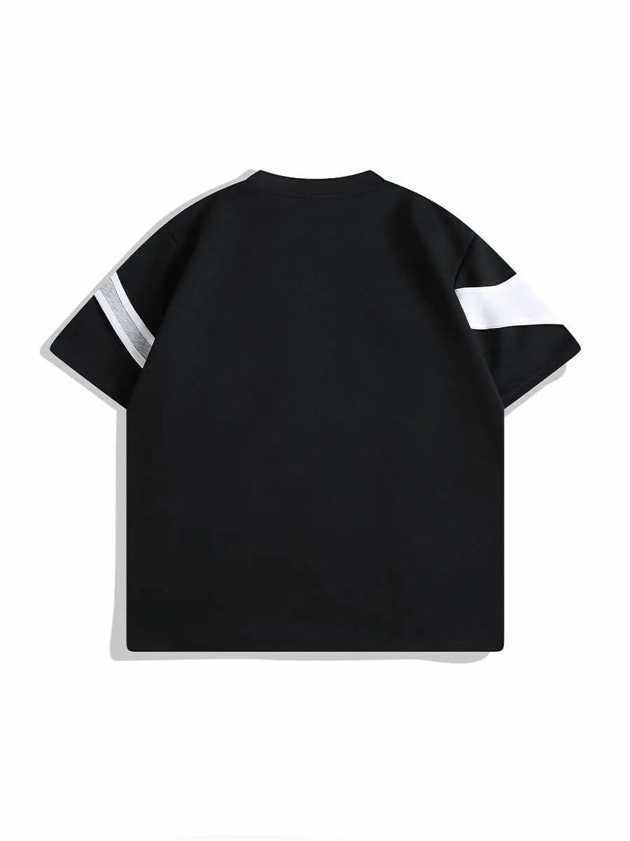 Black and white loose fit t-shirt with padded shoulders and double stitching detail