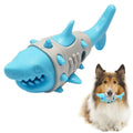 Blue shark-tooth textured dog teething toy with vent holes on rubber surface