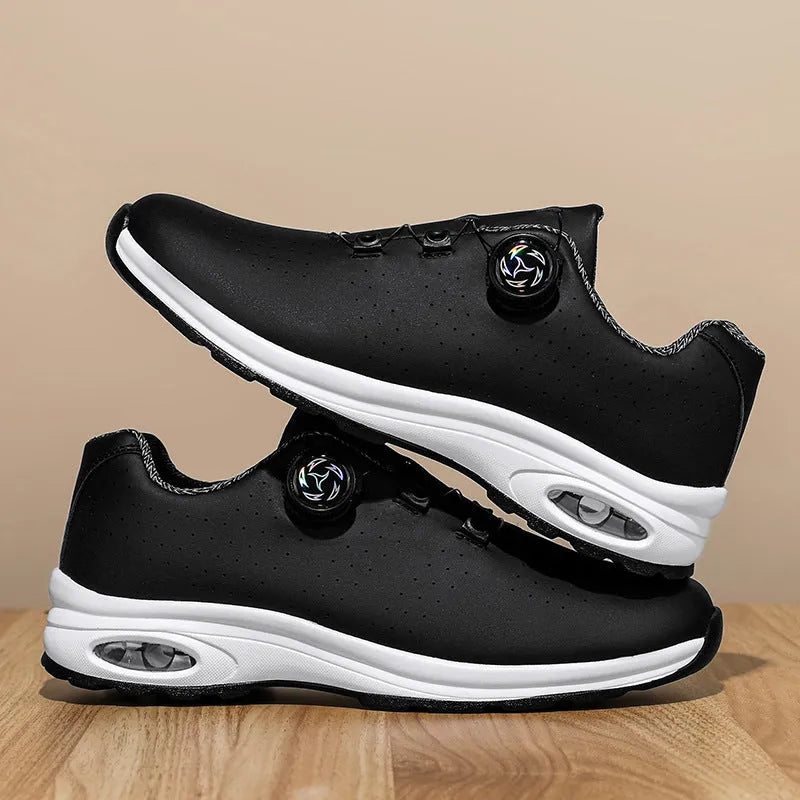 Men's black low-top casual shoes with mesh upper and white laces on a flat composite sole.