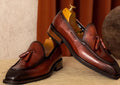 Men's black genuine leather loafers with fringed design and rubber sole