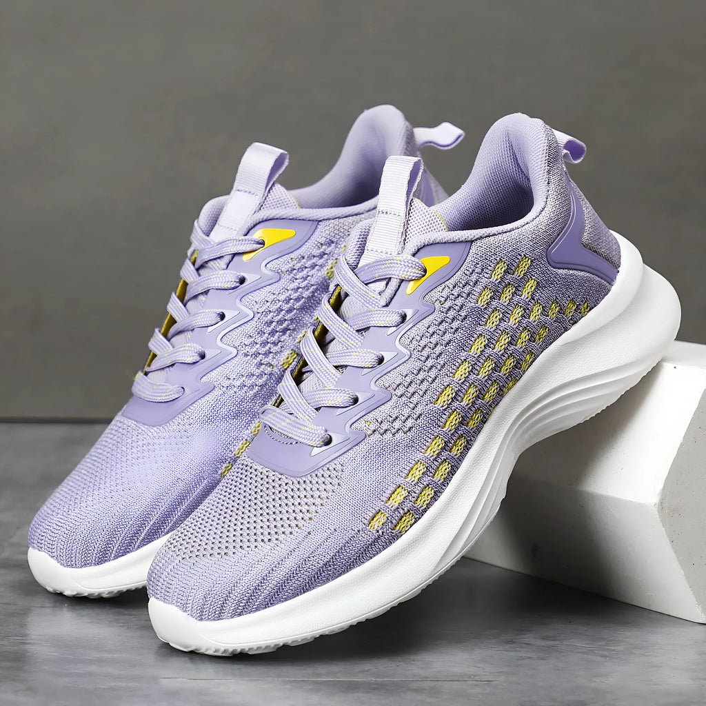 Women's Lavender Purple Flyknit running shoes with mesh upper and striped pattern on an EVA sole.