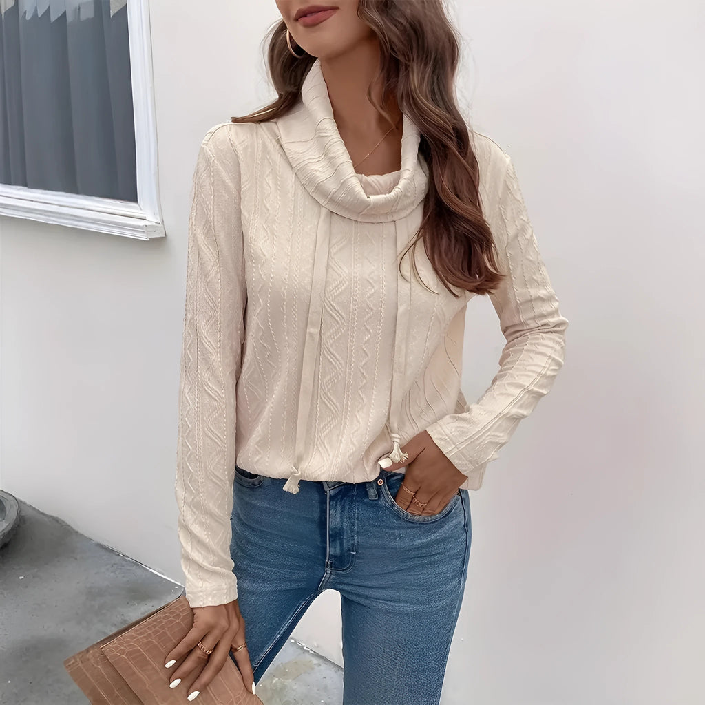 Apricot coloured hooded pullover sweater with long sleeves and drawstring adjustment