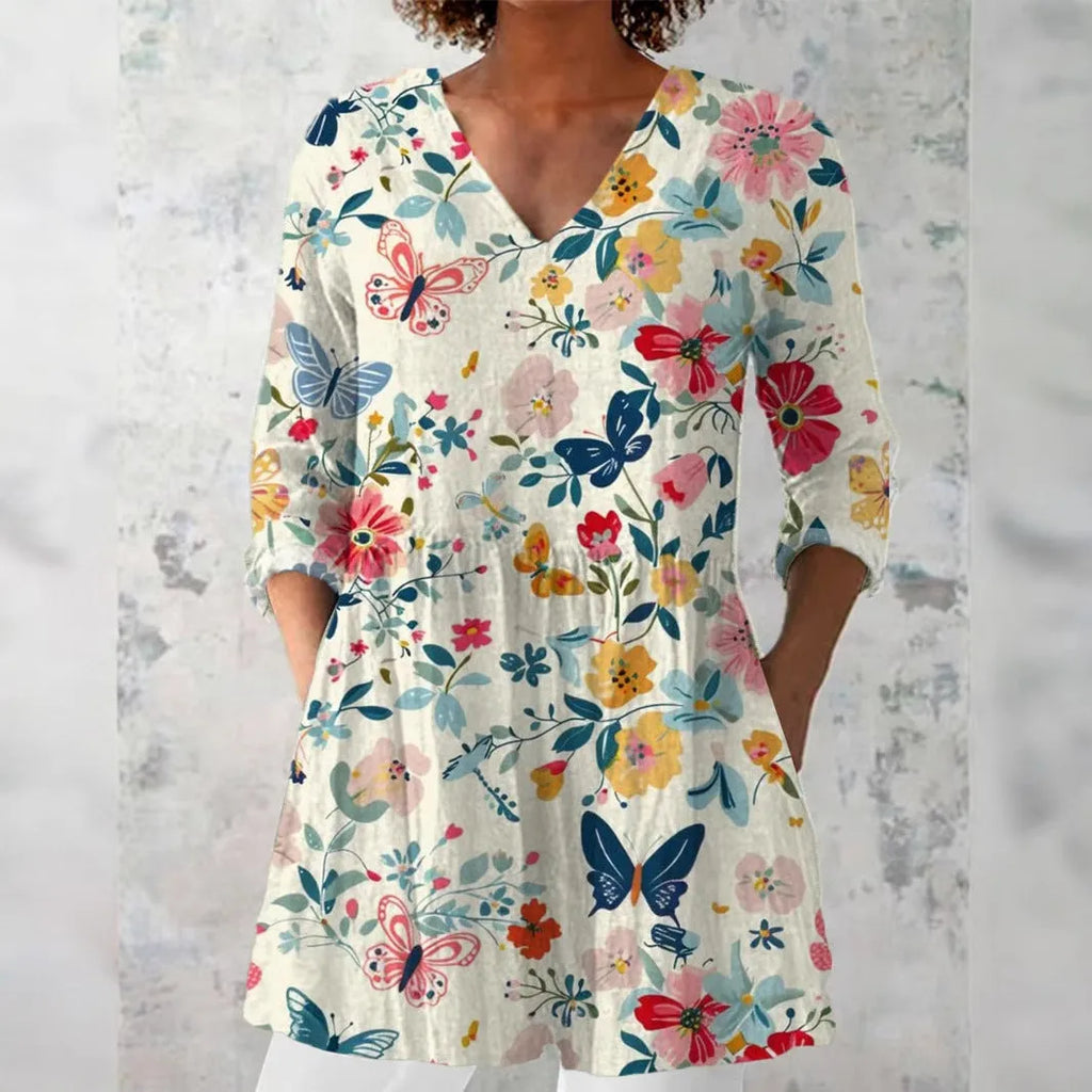 Women's slim fit long-sleeved top with retro digital print design in a colour selection.