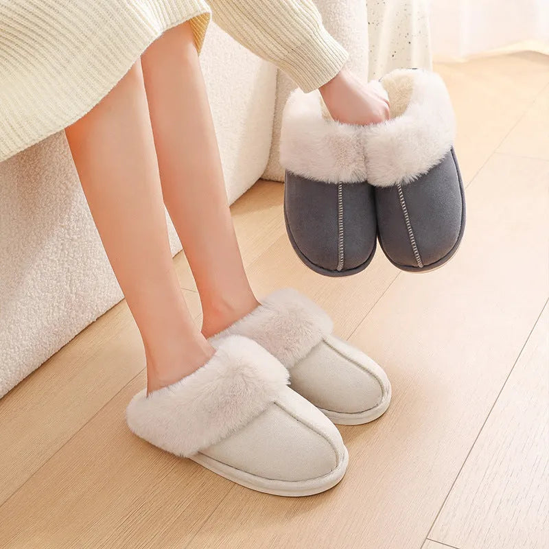 Brown plush women's slippers with a round toe, flat heel, and textured non-slip sole.