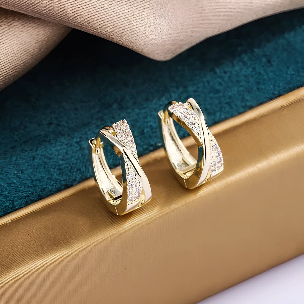 Geometric wild earrings in copper with zircon details and 14K yellow finish