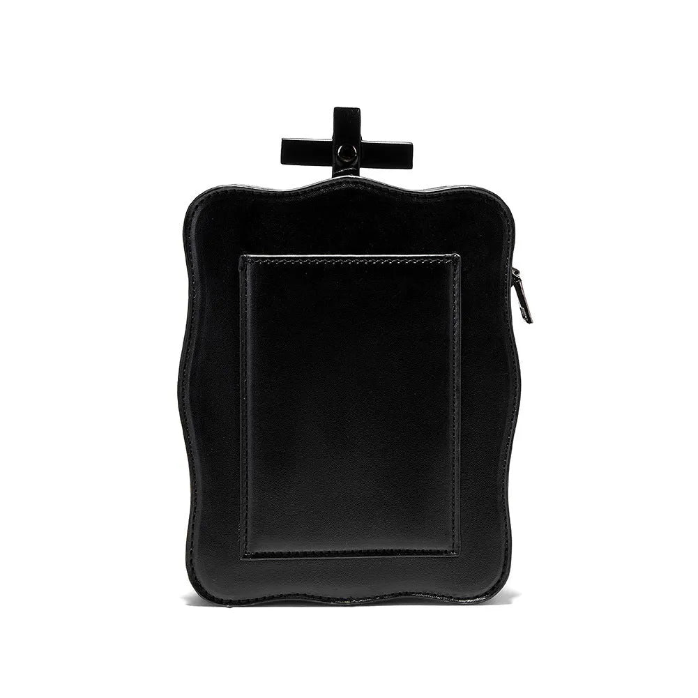 Black mini square messenger bag with gothic stitching, rivets, and skull design