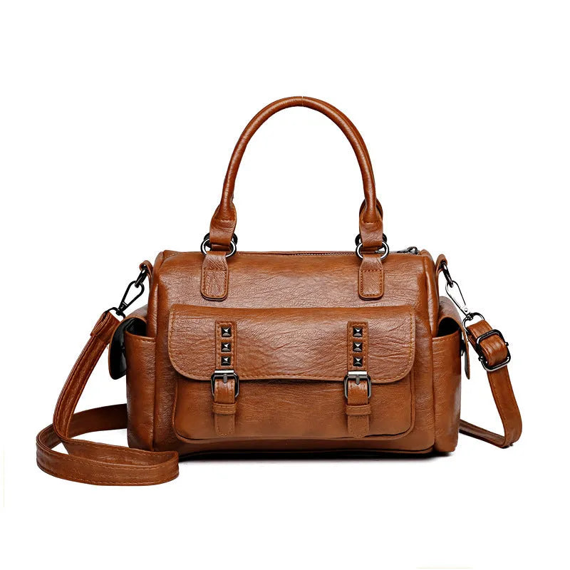 Vintage messenger bag in horizontal square shape with contrast stitching, shown in available colour options