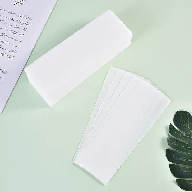 Pack of non-woven fabric hair removal wax strips for waxing treatments