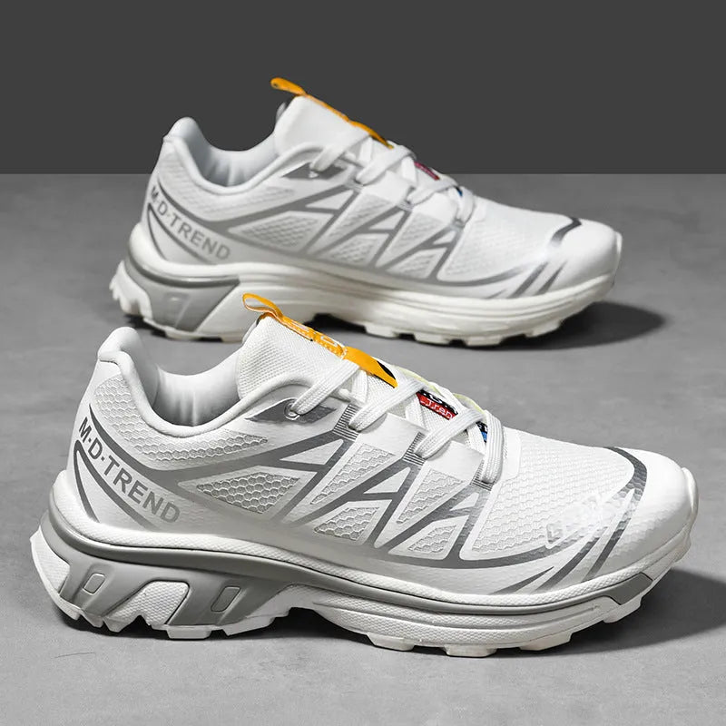 Low-top artificial leather hiking shoes with mesh lining and rubber sole in multiple colour options.