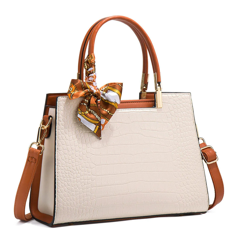 Milky white women's large shoulder handbag with internal compartments and slit pocket.