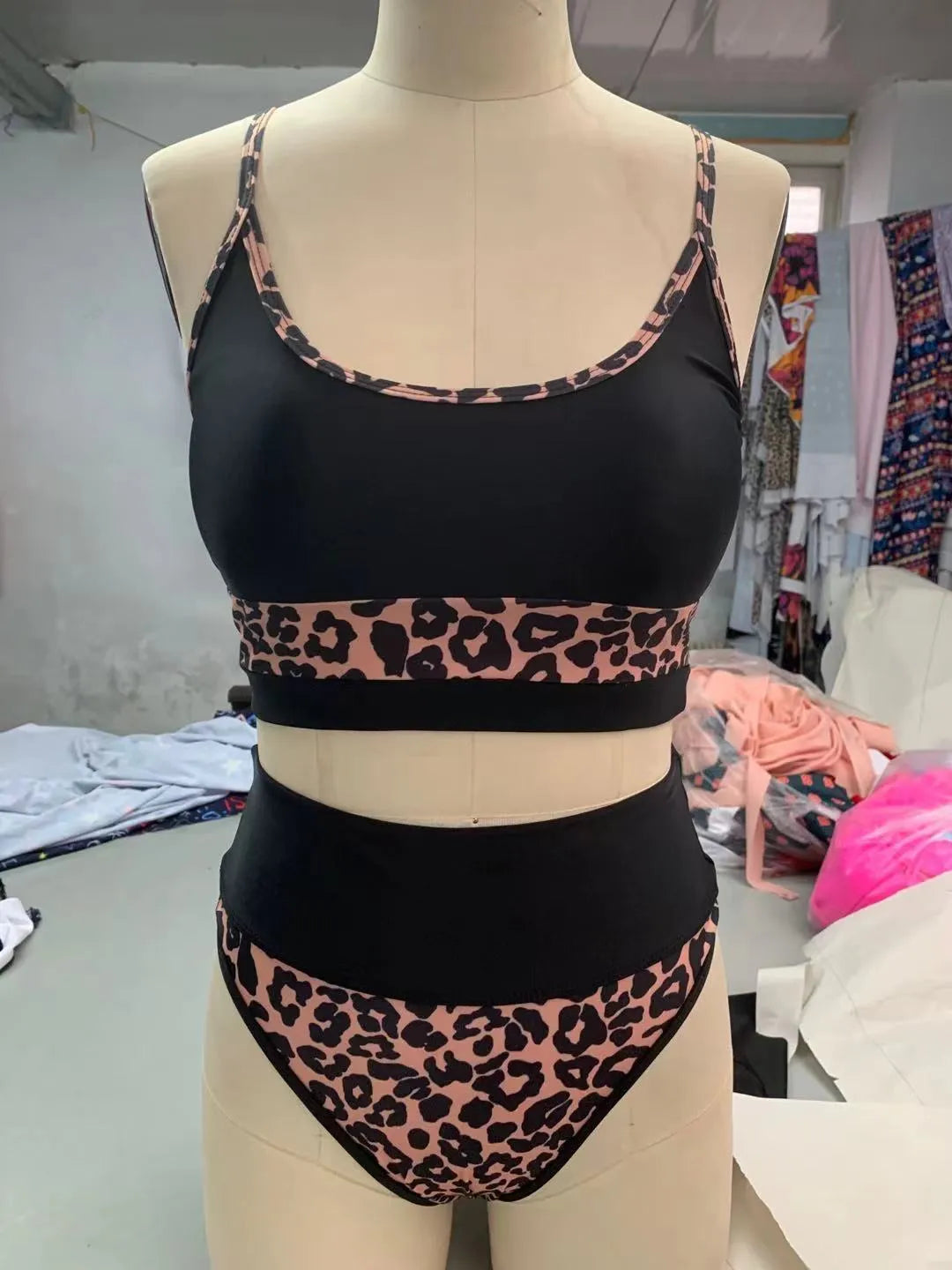 Women's high waist split bikini swimsuit in nylon fabric showing leopard print and white colour options