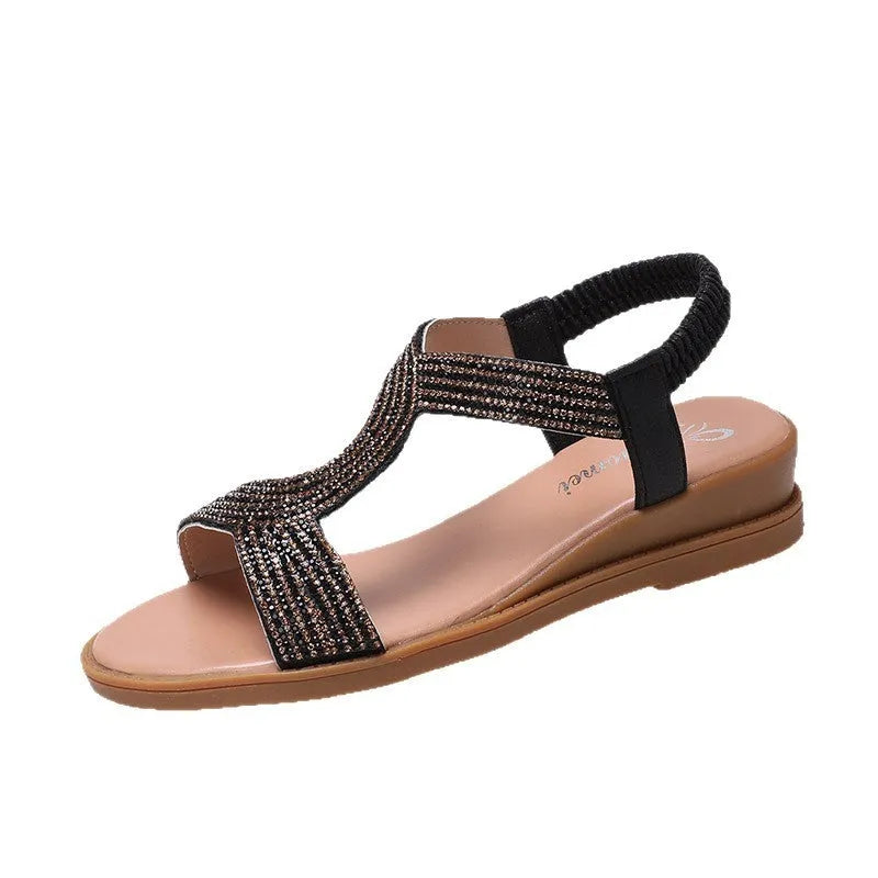 Women's gold patent leather beach sandals with rhinestone decorations and round toe design