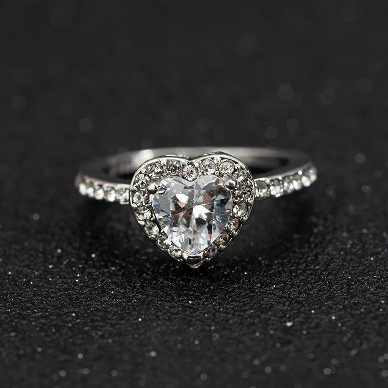 Heart-shaped women's wedding ring with crystal details in rose gold electroplated finish