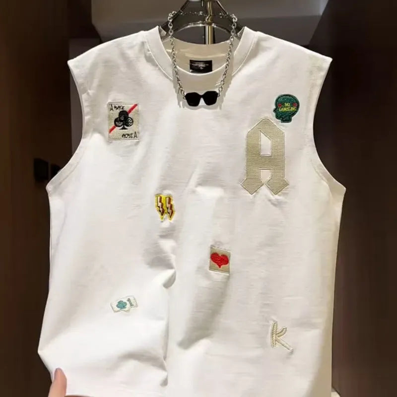 Men's black cotton sleeveless vest T-shirt with a cartoon print graphic, showing loose fit.
