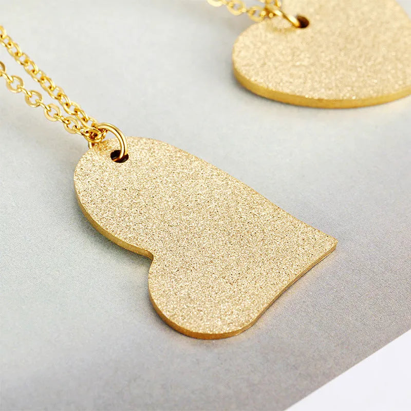 Women's silver heart-shaped titanium steel necklace with minimalist geometric design