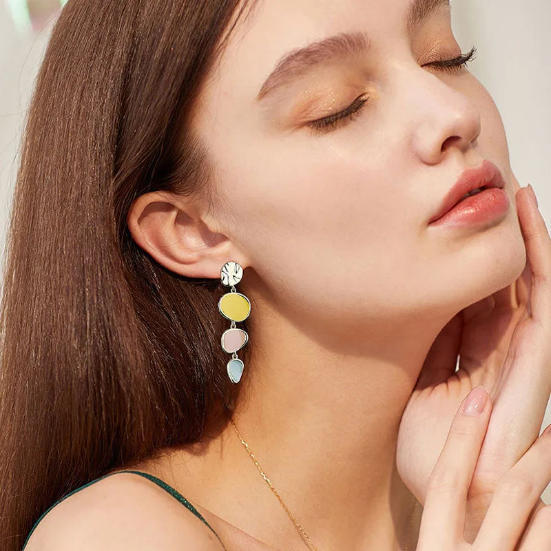 Morandi three-colour oil drip treated alloy disc stud earrings on Sterling silver posts.