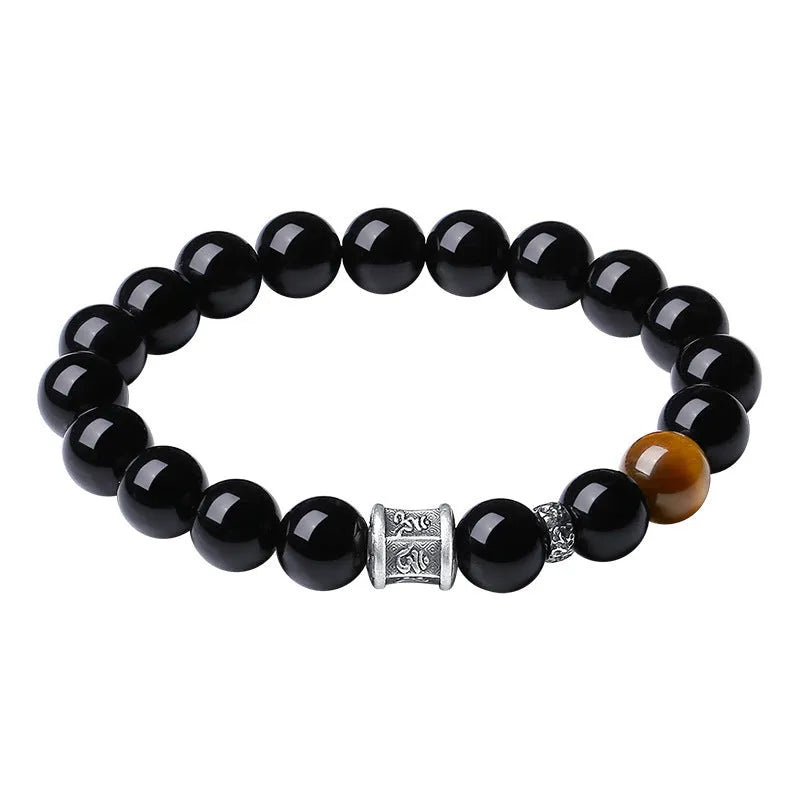 Men's hand-woven obsidian bracelet with 10mm beads, prayer wheel, and silver components