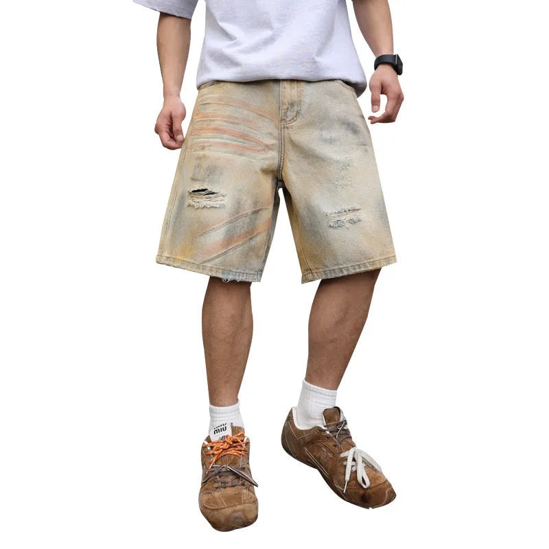 Light blue distressed denim shorts for men with ripped details and straight-leg fit.