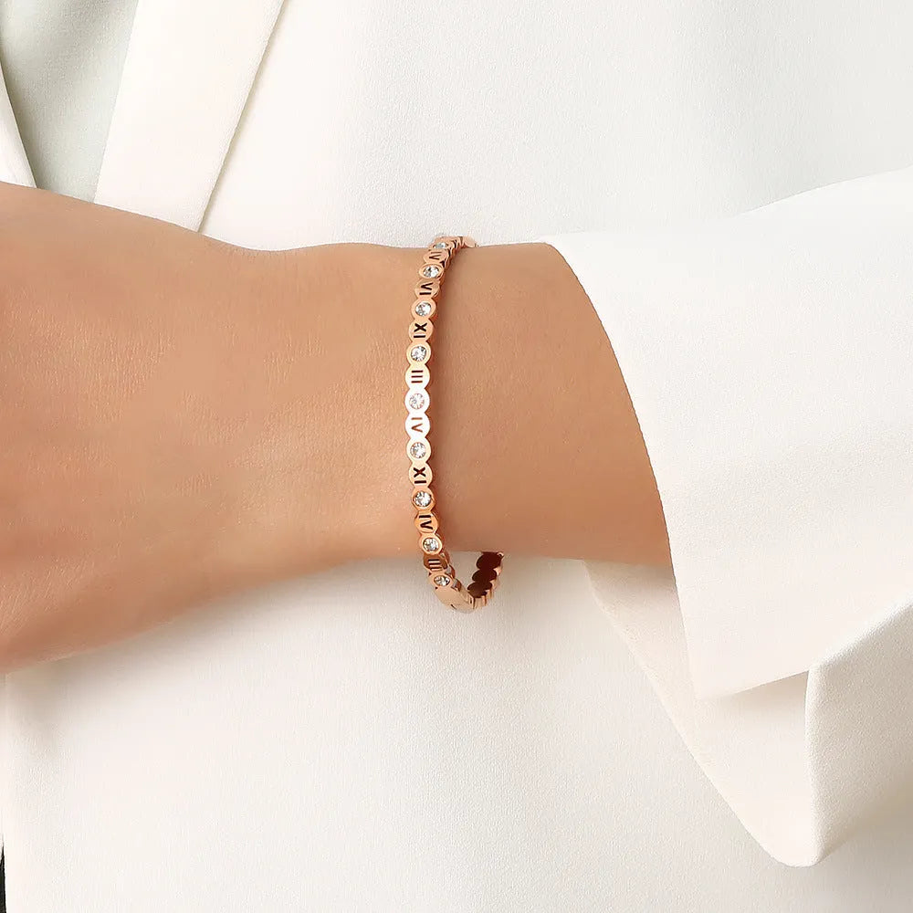 Titanium steel bracelet with number engraving in Korean style, shown in gold, rose gold, and steel colour options