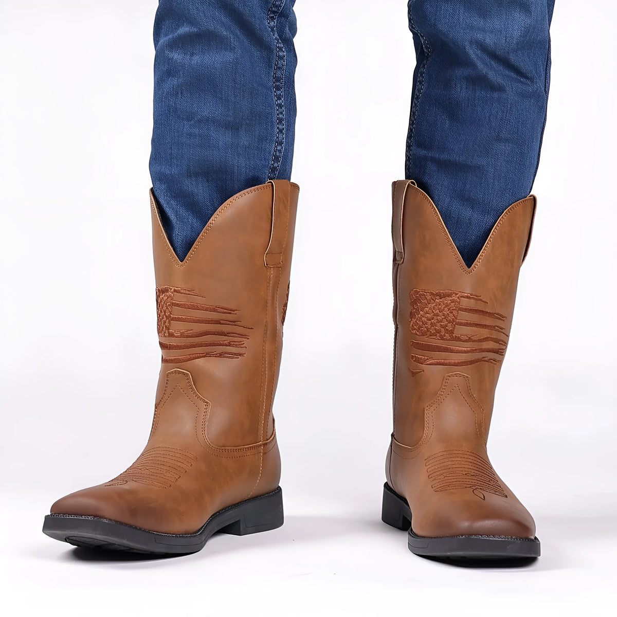 Men's brown retro cowboy boot with square toe and high top embroidered detail on artificial leather.