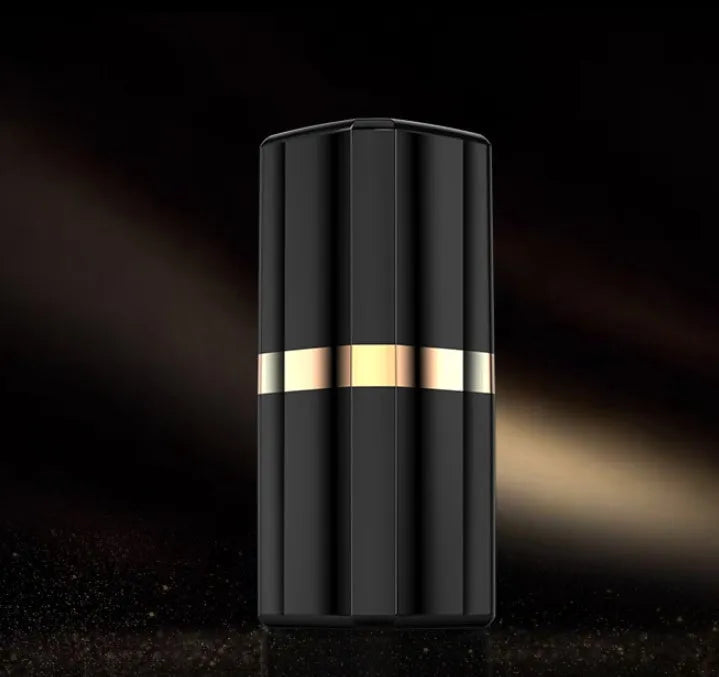 Black lipstick case open to reveal matching wireless Bluetooth earbuds with a contoured in-ear design.