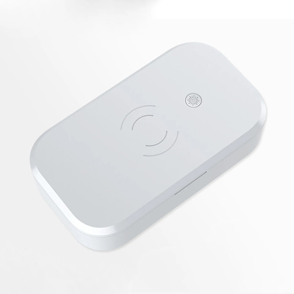 White ultraviolet disinfection box with built-in wireless phone charger for sterilising nail art tools