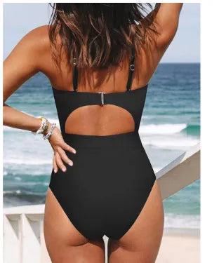Women's solid color one-piece swimsuit with cross back design in black, wine red, or peacock blue