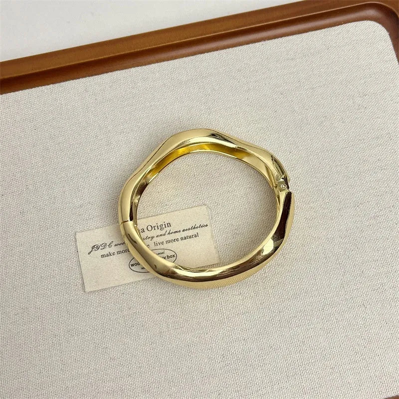 Irregular open cuff bracelet in electroplated zinc alloy with round ring and branch design, simple style